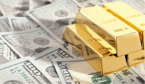 Gold Bars on top of cash